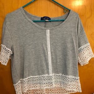 Francesca’s grey top with woven bottom